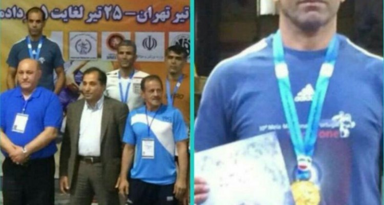 مصطفی قلعه شاهینی بر سکوی قهرمانی کشتی در رده سنی پیشکسوتان کشور ایستاد