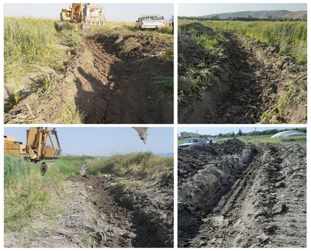 رفع تجاوز رودخانه فصلی چهار طایفه اسلام آبادغرب